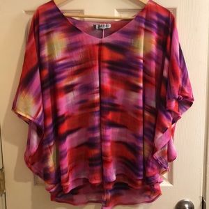 Layered poncho style blouse